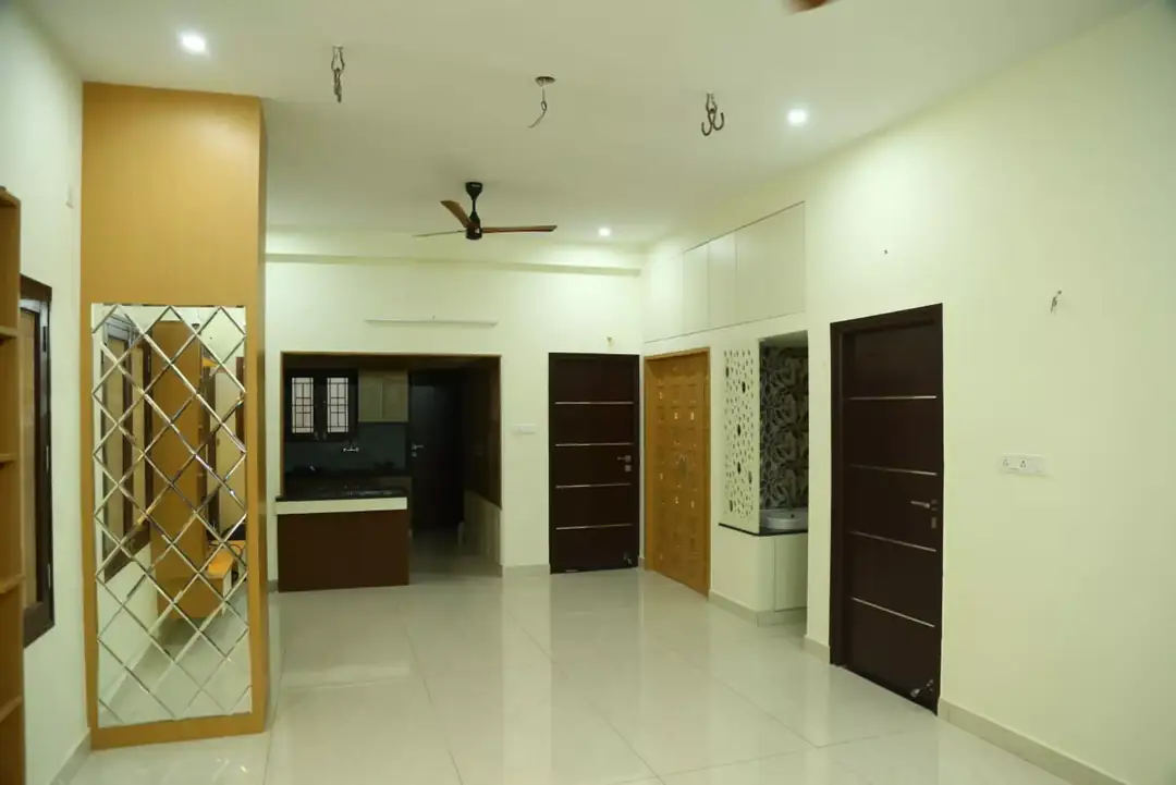 Open hall with a mirrored partition, laminate doors and glossy vitrified flooring, Kolathur